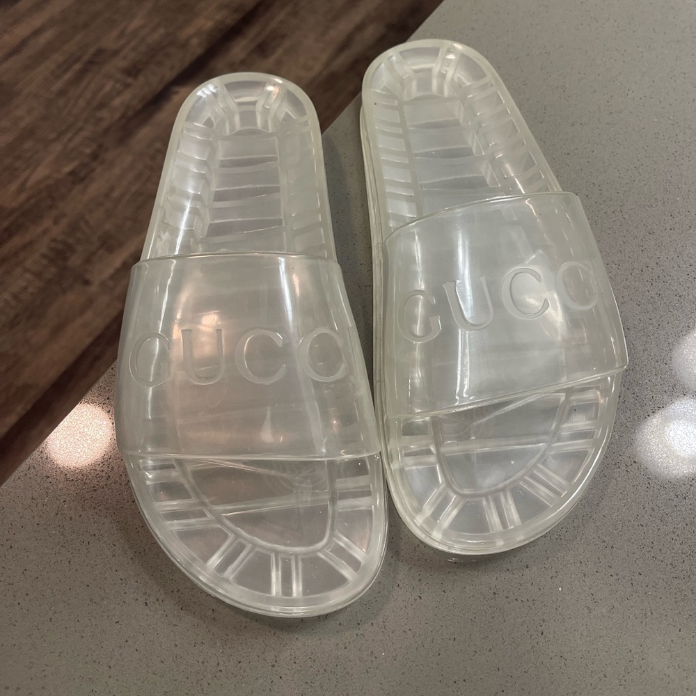 Gucci translucent flip flops
